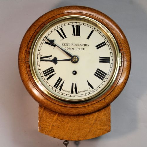 SMALL ENGLISH FUSEE DROPDIAL WALL CLOCK WITH AN 8 DIAL AND LIGHT OAK CASECIRCA 1905