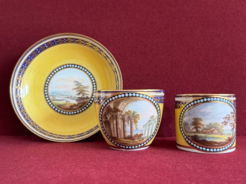 A DERBY PORCELAIN TRIO IN PATTERN 311 DECORATED BY GEORGE ROBERTSON C1797