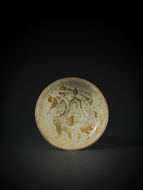 A KASHAN LUSTRE BOWL DEPICTING A HORSE AND RIDER PERSIA 12TH 13TH CENTURY