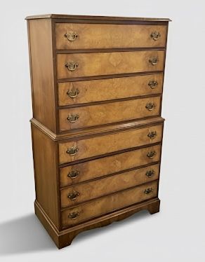 EARLY 20TH CENTURY FIGURED WALNUT TALLBOY