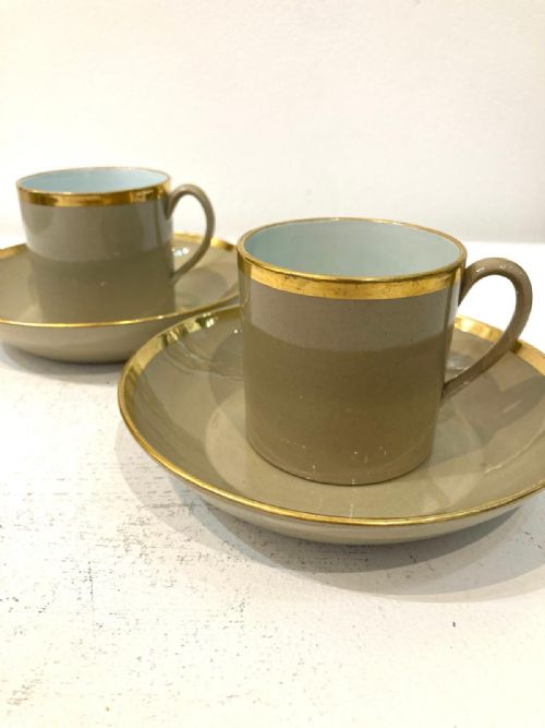 TWO 1820'S WEDGWOOD DRABWARE COFFEE CUPS AND SAUCERS