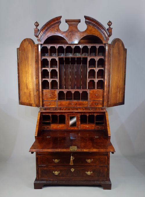 A FINE QUEEN ANNE BURR WALNUT BUREAU BOOKCASE C 1710